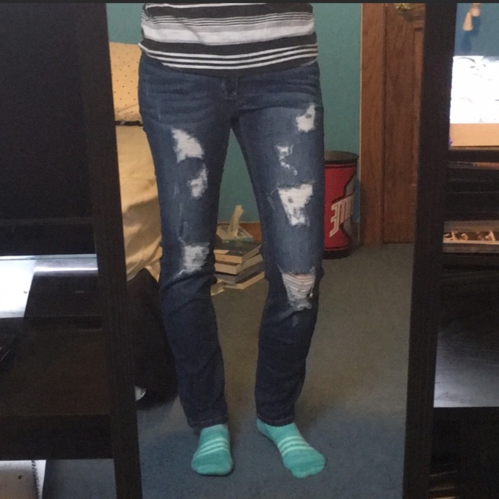 Distressed denim jeans